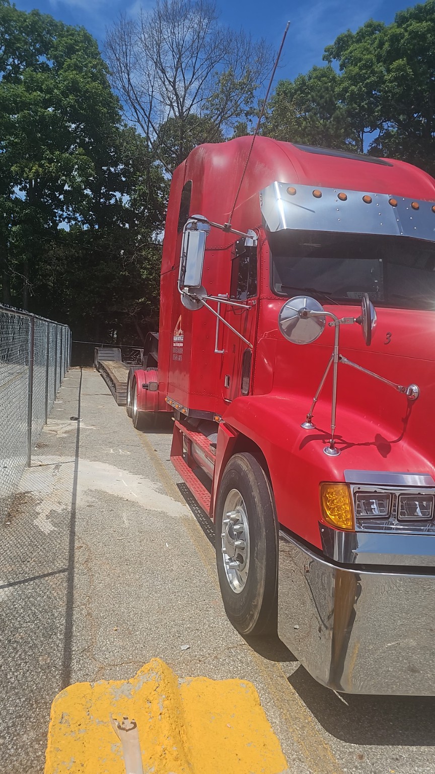 D&L boom truck working on a framing jobsite